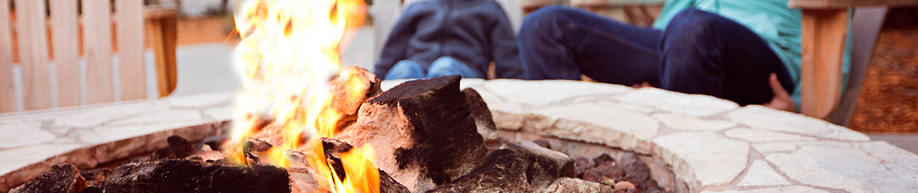 close up of firepit burning in backyard