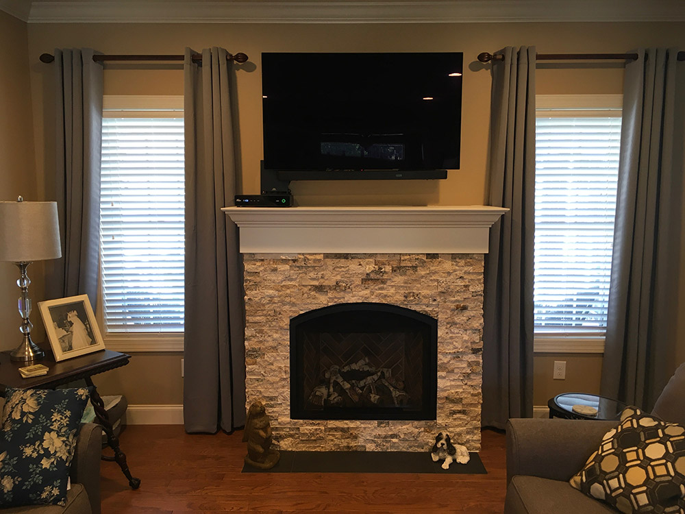 finished living room with fireplace