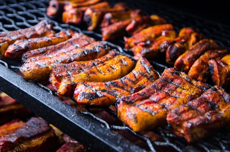 meat grilling on a pellet grill smoker