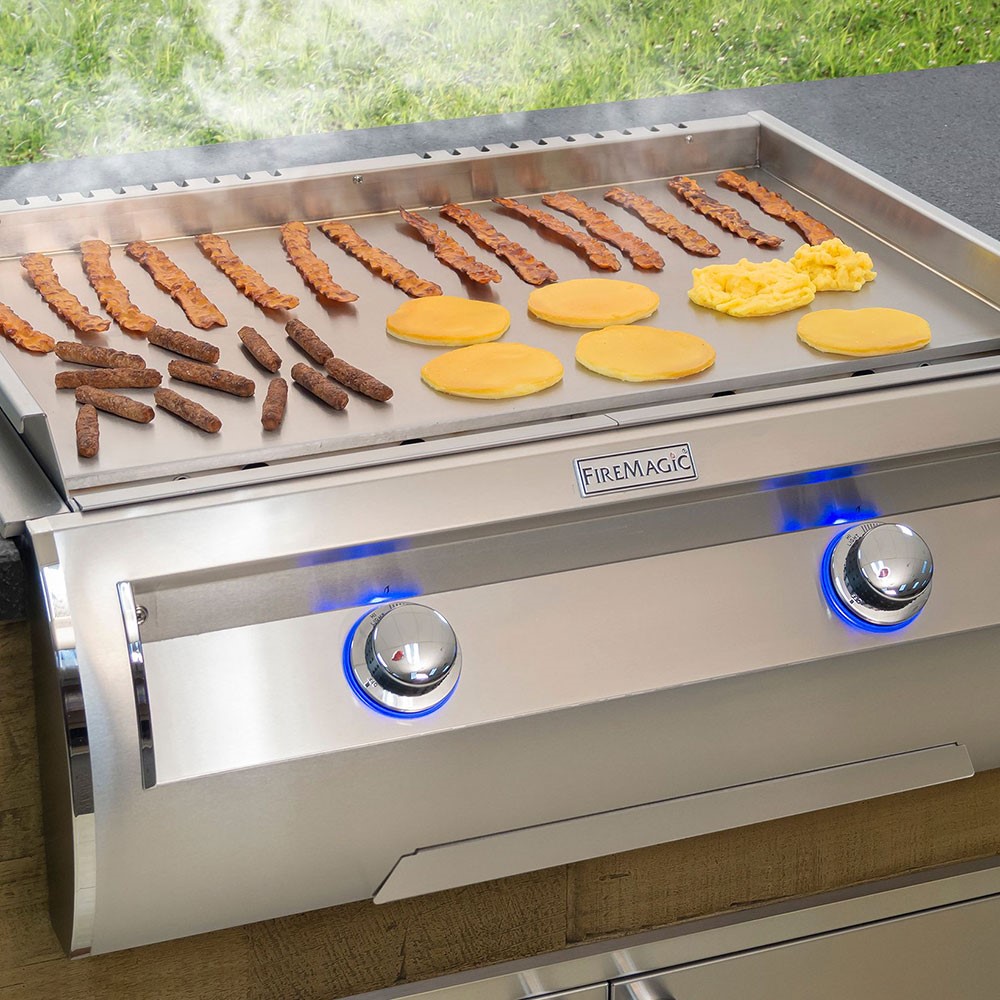 food cooking on a Fire magic griddle
