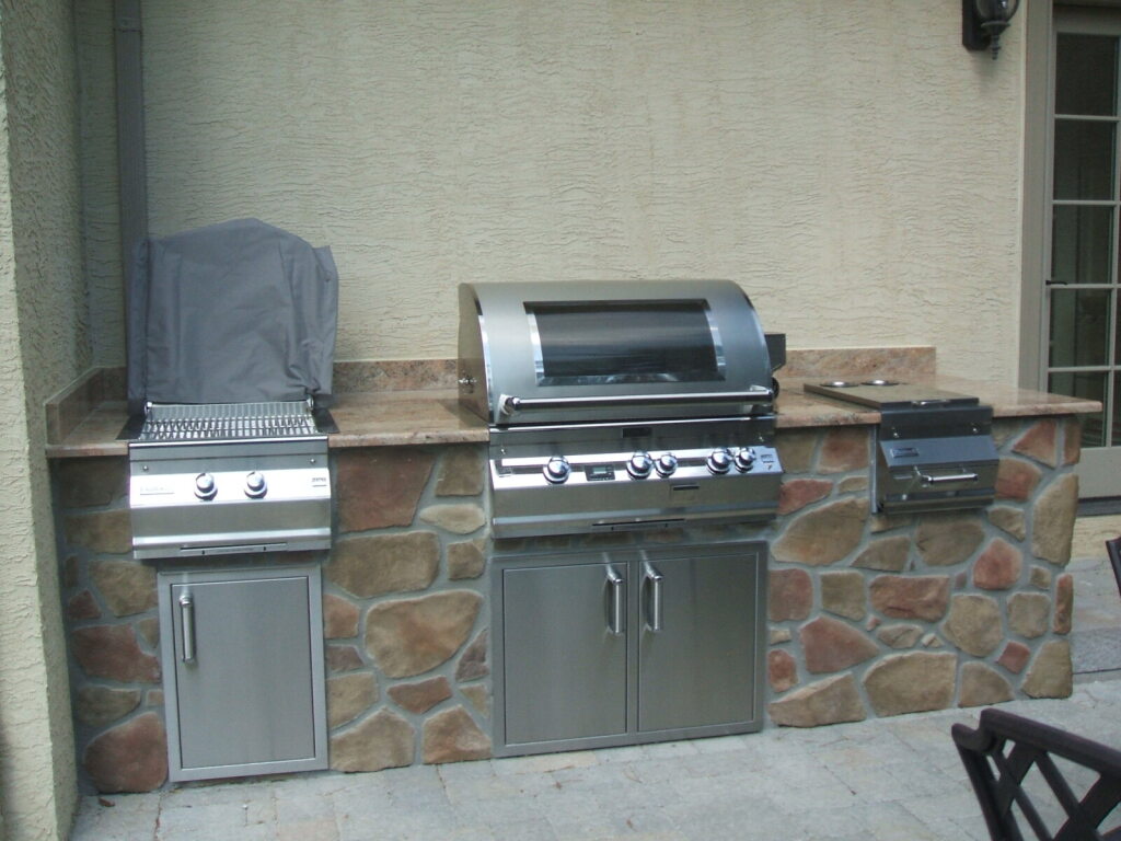 an outdoor kitchen space